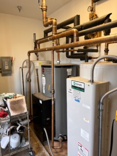 Commercial tank water heaters with insulated copper piping